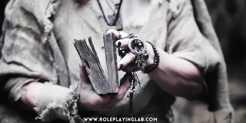 Black and white photo of woman wizard with a spell book—Can Spells Do Critical Damage in DND?