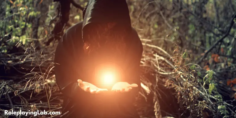 Cloaked figure casting magic—Melee Spell Attack
